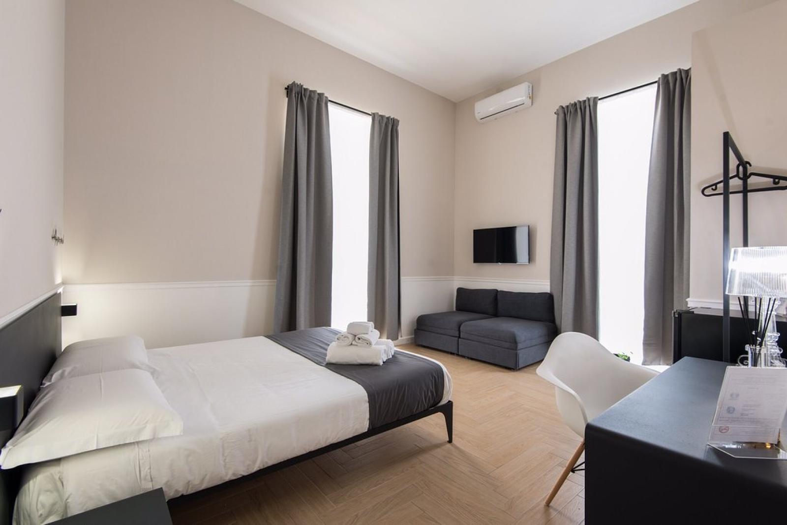 Camera Tripla Superior con divano letto